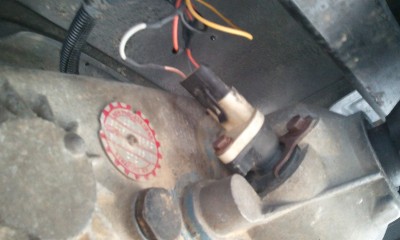 Speed sensor is on the transfer case tail shaft